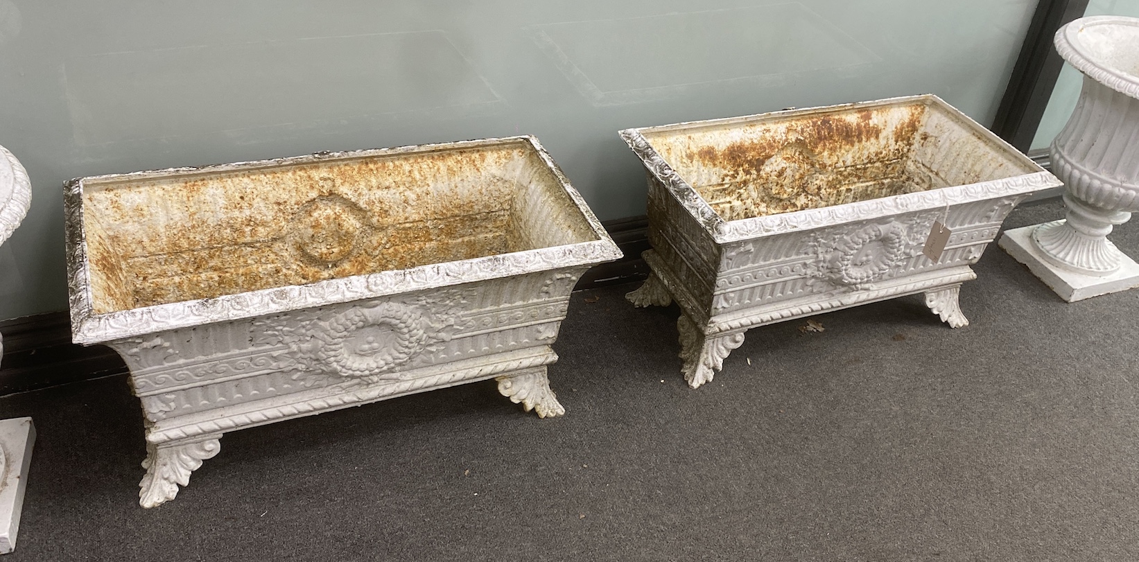 A pair of Victorian style rectangular cast iron planters, width 71cm, depth 36cm, height 36cm